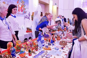 Visitors buy Russian traditional products at The Russian Consulate General in HCMC's booth