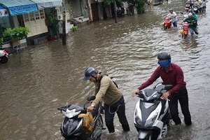 Nguyên nhân gây ngập cơ bản nhất là công tác xử lý thoát nước của TP chưa tốt