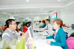 Ngân hàng giảm lãi suất cho nông dân và doanh nghiệp
