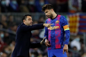 Xavi Hernandez và Gerard Pique