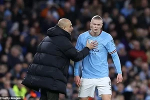 Pep Guardiola và Erling Haaland