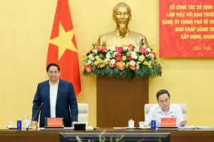 Bí thư Đảng ủy Chính phủ, Thủ tướng Chính phủ Phạm Minh Chính và Bí thư Đảng ủy Quốc hội, Chủ tịch Quốc hội Trần Thanh Mẫn đồng chủ trì hội nghị. Ảnh: VIẾT CHUNG