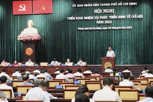 TPHCM: Hỗ trợ doanh nghiệp phục hồi sản xuất, chăm sóc sức khỏe người dân hậu Covid-19