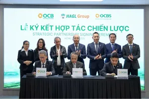 OCB, OCBS và HAGL ký kết hợp tác chiến lược thúc đẩy tài chính xanh ngày 25-11. Ảnh: NHUNG NGUYỄN