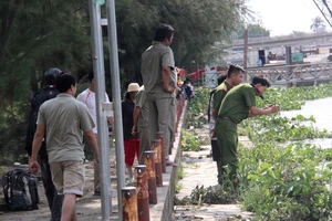 Công an khám nghiệm 1 vụ án trước đó. Ảnh minh họa: C.T.