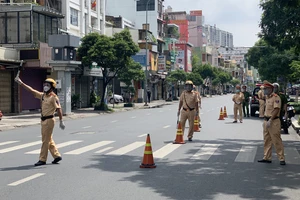 Công an quận 3, đảm bảo giao thông thông thoáng trên các tuyến đường trên địa bàn. Ảnh: CHÍ THẠCH 