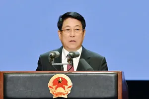 Chủ tịch nước Lương Cường phát biểu tại Lễ kỷ niệm 50 năm Quốc khánh nước Cộng hòa Dân chủ Nhân dân Lào. Ảnh: VIẾT CHUNG