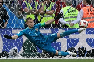 Igor Akinfeev và tình huống cản cú sút luân lưu quyết định