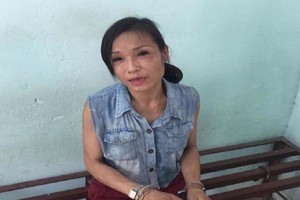 在公安機關的黎氏素娥（圖片來源：互聯網）