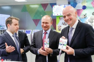 普京拿到“球迷身份證”。