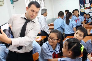 來越任教的外籍勞工。