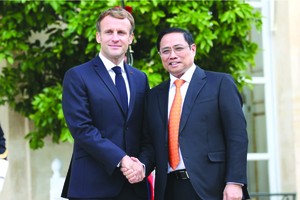 政府總理范明政會見法國總統 馬克龍。