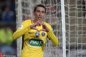 Angel Di Maria ăn mừng cú đúp vào lưới Rennes. Ảnh: Getty Images.