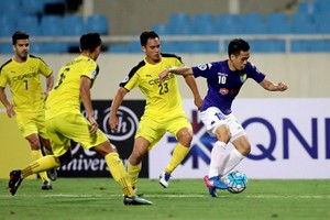 河內隊（深藍衣）與Ceres-Negros隊比賽一瞥。（圖源：互聯網）