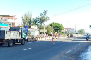 经过咸胜坊1号国道的路障已被拆除。