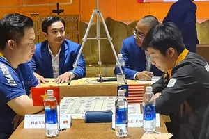 Hà Văn Tiến (trái) từng thi đấu thành công tại SEA Games 31 vừa qua. Ảnh: NGUYỄN THÀNH TRUNG