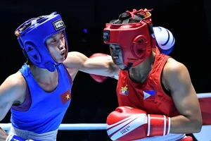 Nguyễn Thị Tâm (giáp xanh) đã có chiến thắng đầu tiên tại giải vô địch châu Á năm nay. Ảnh: ASBC