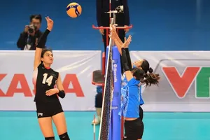 Vi Thị Như Quỳnh (áo thẫm) đã chơi tốt ở trận tứ kết qua đó giúp Quảng Ninh lọt vào bán kết Đại hội thể thao toàn quốc năm nay. Ảnh: DŨNG PHƯƠNG