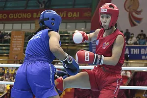 Bùi Hải Linh (đỏ) là một trong những võ sĩ đã giành được HCV tại giải vô địch quốc gia năm nay. Ảnh: TRẦN KHÁNH