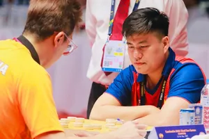 Lại Lý Huynh thi đấu SEA Games 32 và giành được HCV cờ tiêu chuẩn cá nhân nam. Ảnh: MINH THẮNG