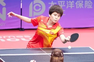 Nguyễn Khoa Diệu Khánh cùng đồng đội đã lọt vào tứ kết đồng đội nữ tại ASIAD 19. Ảnh: LƯỢNG LƯỢNG