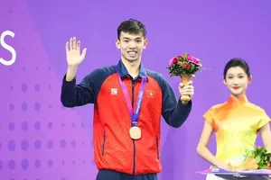 Huy Hoàng giành HCĐ nội dung 800m tự do tại ASIAD 19 đồng thời đạt chuẩn dự Olympic năm 2024 từ kết quả trên. Ảnh: LƯỢNG LƯỢNG