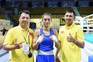 Võ sỹ boxing (quyền Anh) Nguyễn Thị Tâm cùng HLV Như Cường là những người từng giành suất Olympic Tokyo (Nhật Bản) 2020 cho thể thao Việt Nam và thể thao Hà Nội. Ảnh: NHƯ CƯỜNG