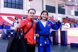 Hoàng Thị Tình và HLV Nguyễn Duy Khanh sẽ tập luyện tối đa tại Việt Nam trước khi đi Pháp. Ảnh: PERUJUDO