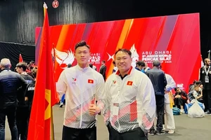 Tấn Sang (trái) tiếp tục là VĐV chủ lực của đội tuyển pencak silat năm 2025. Ảnh: N.T.SANG