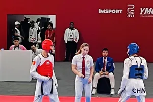 Tuyển thủ taekwondo Việt Nam tranh tài tại Bahrain. Ảnh: TRUNG THÀNH