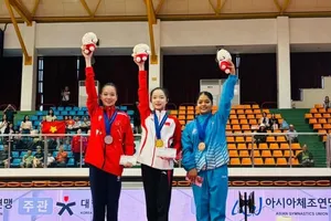 Tuyển thủ Quỳnh Như (áo đỏ) đang là gương mặt quan trọng nhất của đội tuyển TDDC Việt Nam. Ảnh: Q.NHƯ