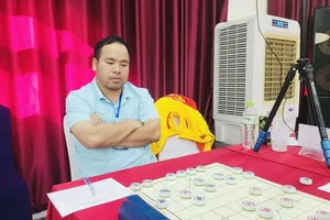Kỳ thủ Nguyễn Minh Nhật Quang của TPHCM đã giành HCV trong nội dung cờ siêu chớp và cờ chớp. Ảnh: VXF