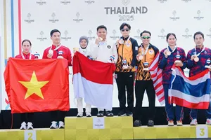 Phạm Quang Huy và Trịnh Thu Vinh có tấm HCB trong ngày tranh tài 15-12. Ảnh: DP