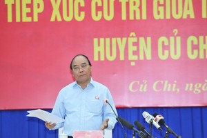 President Nguyen Xuan Phuc: Not to let development make people impoverished