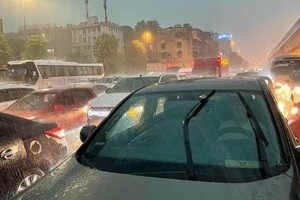 Hanoi experiences cold, rainy weather, while HCMC undergoes the opposite