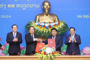 Vietnam, Laos agree on major cooperation orientations for 2024