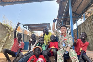 Young lieutenant sowing seeds of peace