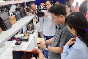 300 counterfeit fashion, beauty items on display to help public spot fakes