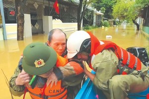 Central Vietnam braces as floods worsen ahead of typhoon No.13