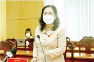 The meeting between Ho Chi Minh City National Assembly Delegation and District 11. (Photo: SGGP)