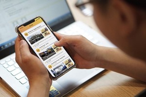 Utop – an app for online shopping using blockchain technology by FPT Group. (Photo: SGGP)