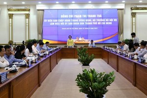 The working session between the delegation of the Home Affairs Ministry with HCMC People’s Committee (Photo: SGGP)