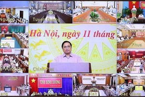 Prime Minister Pham Minh Chinh speaks at the conference (Photo: VNA) 