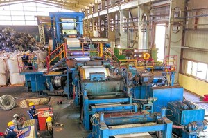 The production line for color-coated corrugated iron in Ton Hoa Sen Co. (Photo: SGGP)