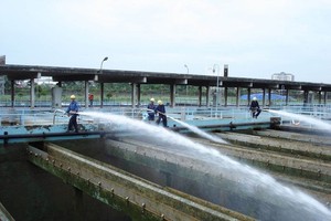 Employees at the water plant strive to ensure safe water supply during the dry season