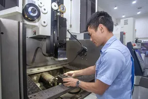 Workers of Makino Co. are using machines to precisely manufacture product details (Photo: SGGP)