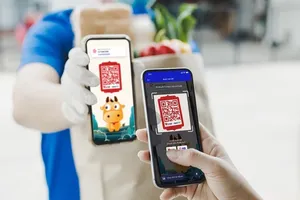 E-payment has become more common nationwide (Photo: SGGP)