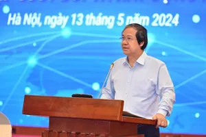 Minister of Education and Training Nguyen Kim Son is delivering his speech in the conference