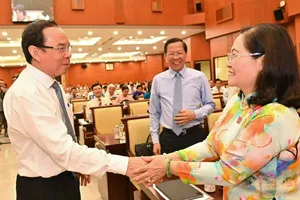 Secretary of the HCMC Party Committee Nguyen Van Nen, Chairman of the HCMC People’s Committee Phan Van Mai, and Chairwoman of the HCMC People’s Council Nguyen Thi Le at the meeting (Photo: SGGP)