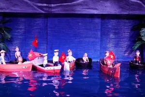 The water puppet show “Truoc ngon song”